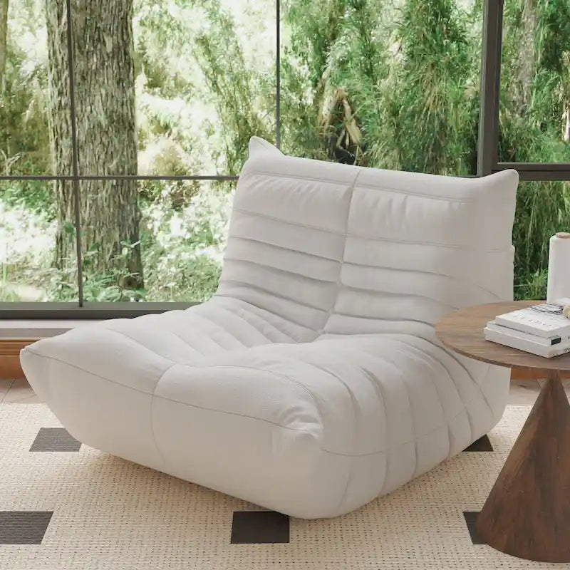 Fauteuil une place en tissu Teddy, type pouf