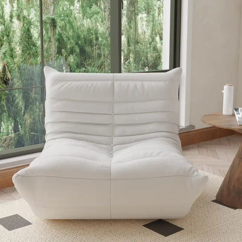 Fauteuil une place en tissu Teddy, type pouf